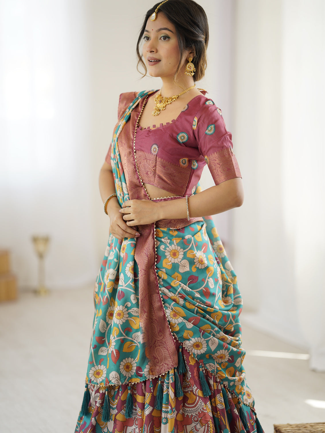 Wine turquoise kalamkari tussar silk lehenga with floral motifs zari border tassel dupatta wedding festive wear