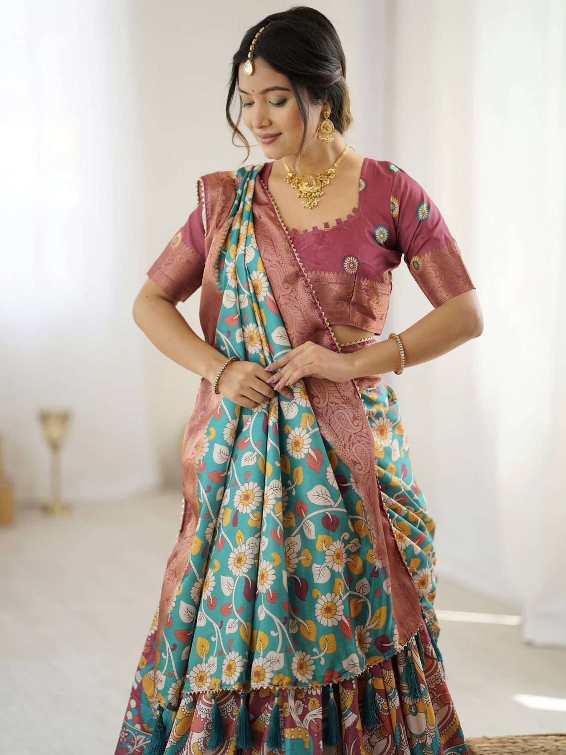 Wine turquoise kalamkari tussar silk lehenga with floral motifs zari border tassel dupatta wedding festive wear