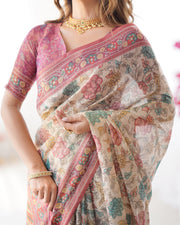 Cream pink handloom cotton saree with pastel floral print and ornamental tree pallu