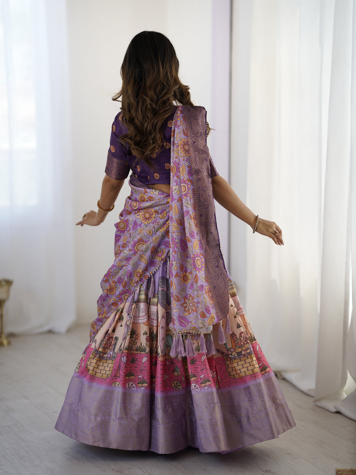 Elegant kalamkari lehenga in lavender and purple with mythical print and floral dupatta