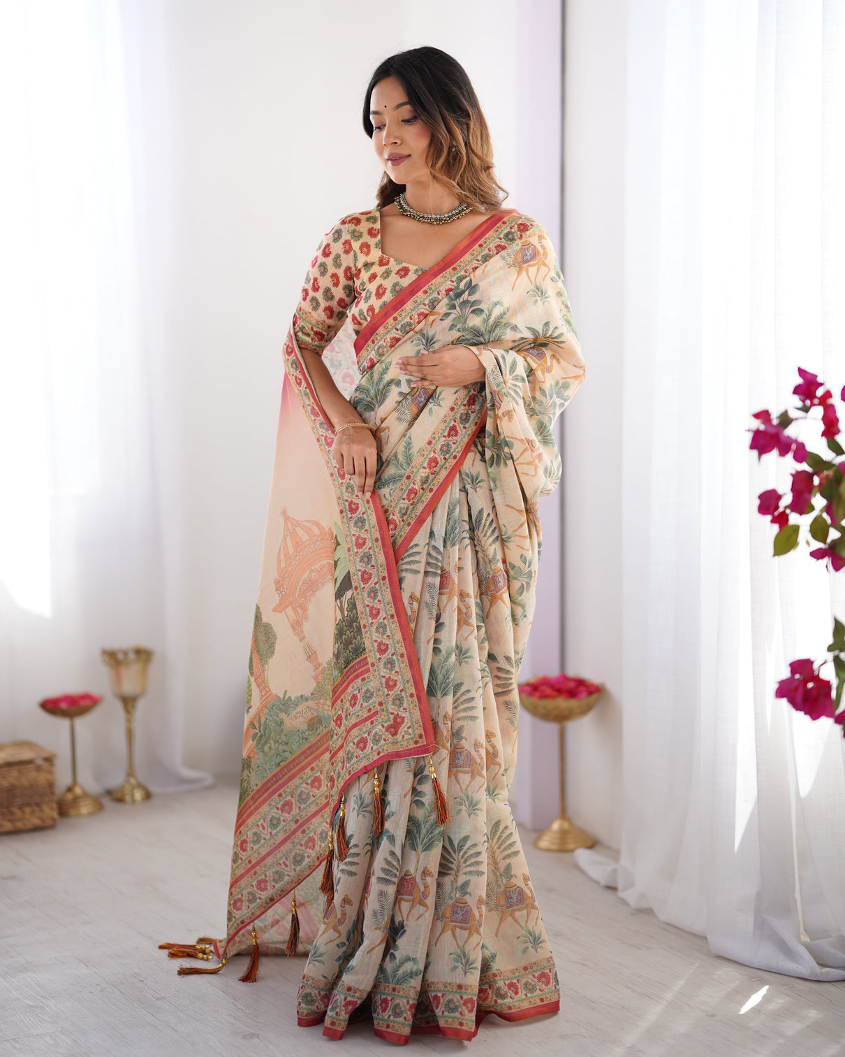 Beige red handloom linen cotton saree with camel caravan palace artwork