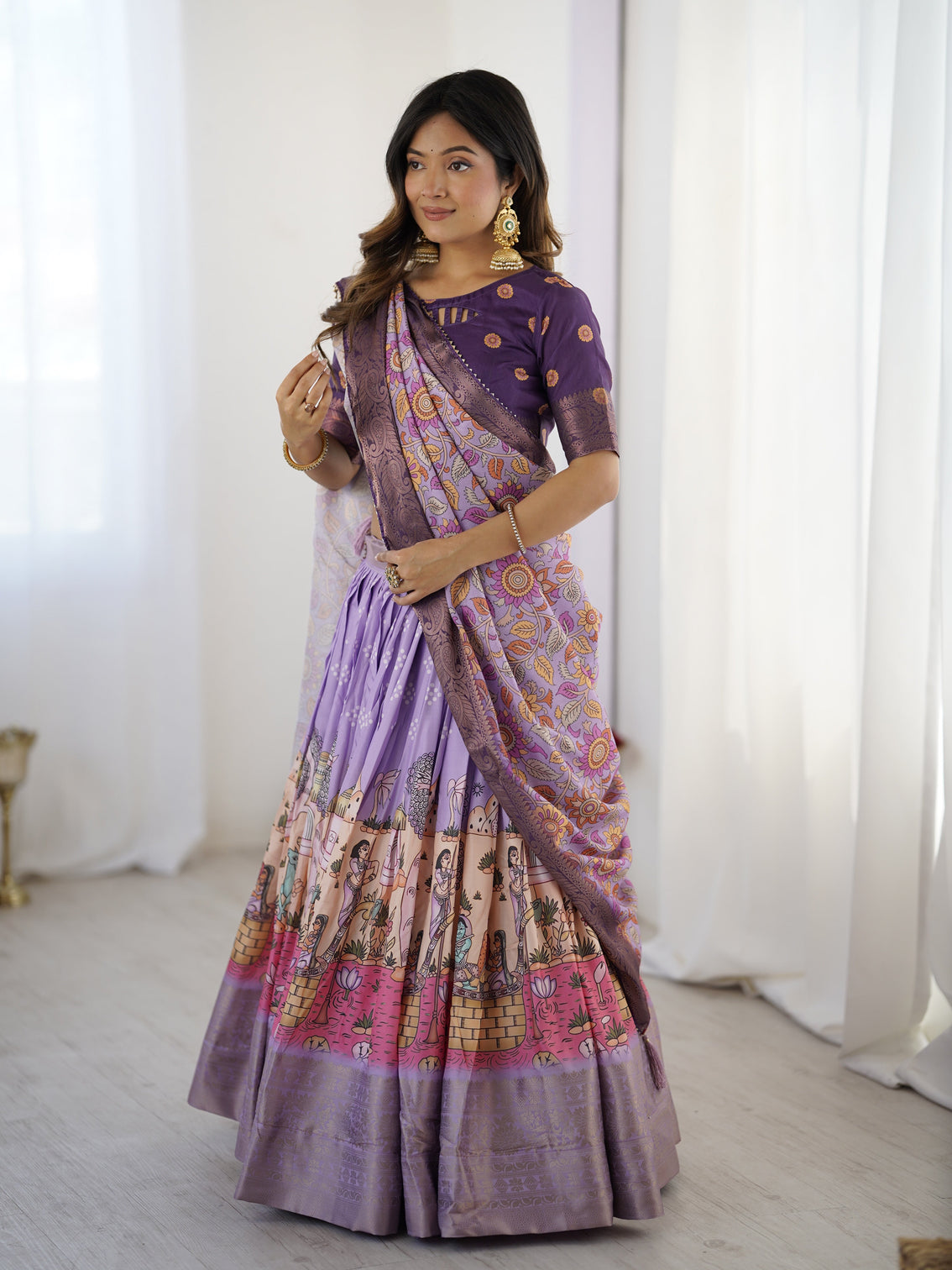Elegant kalamkari lehenga in lavender and purple with mythical print and floral dupatta