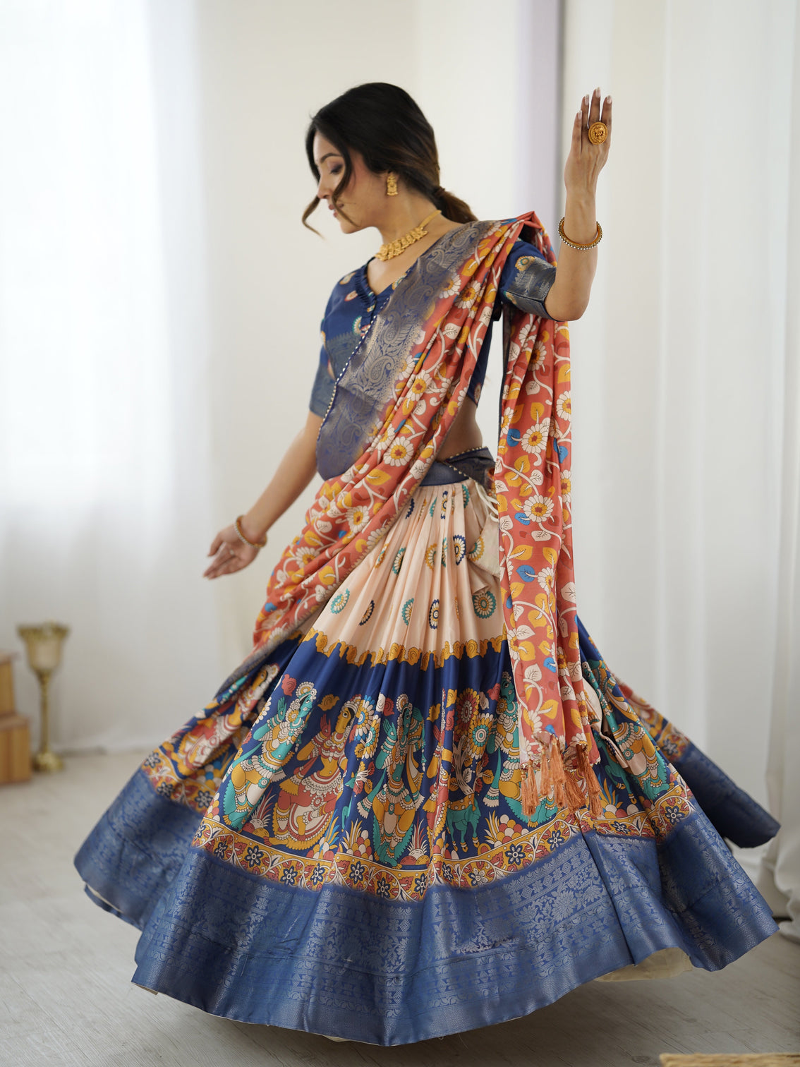 Royal blue peach kalamkari tussar silk lehenga with zari border floral tassel dupatta traditional festive wear