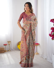 Cream pink handloom cotton saree with pastel floral print and ornamental tree pallu mameraa