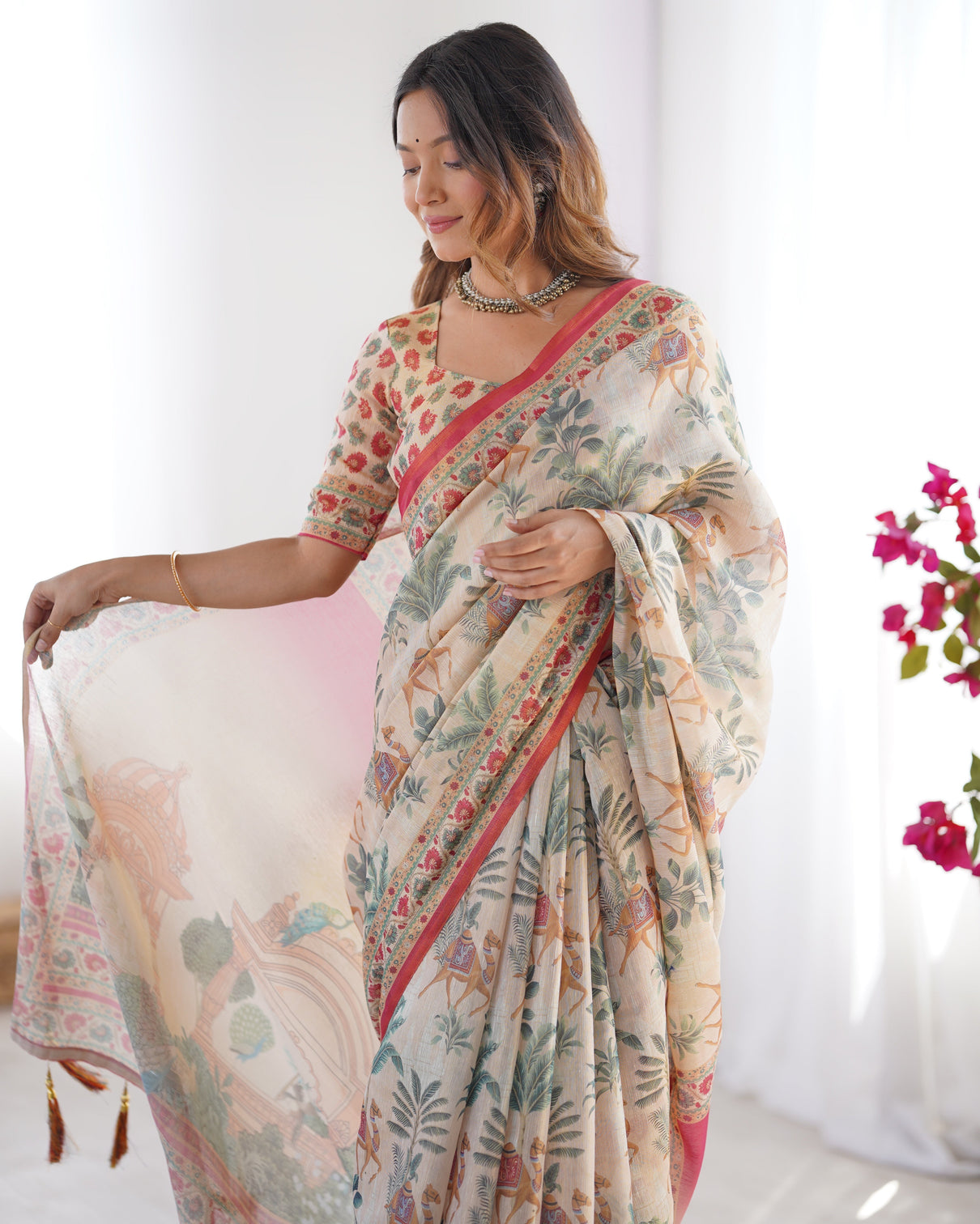 Beige red handloom linen cotton saree with camel caravan palace artwork