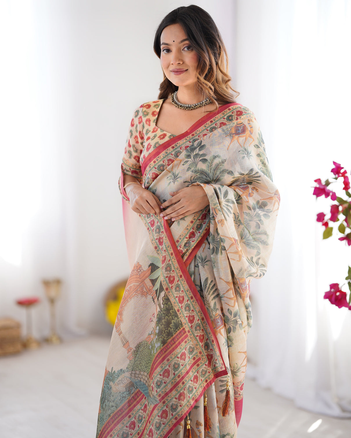 Beige red handloom linen cotton saree with camel caravan palace artwork