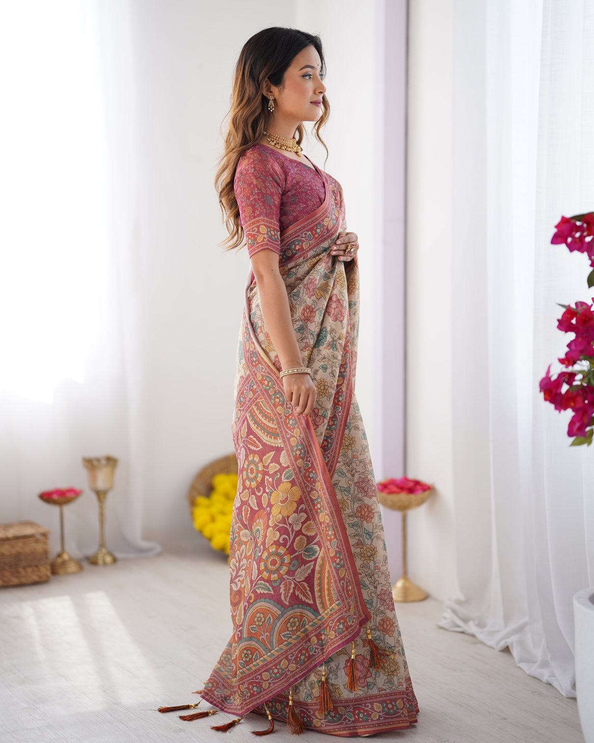 Cream pink handloom cotton saree with pastel floral print and ornamental tree pallu