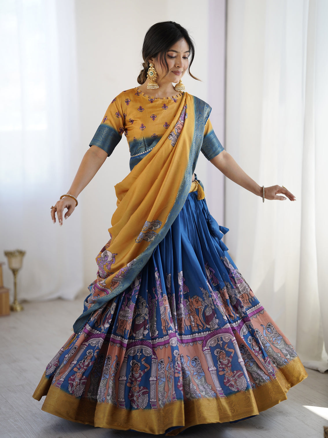Elegant kalamkari lehenga in mustard and royal blue with flared skirt and dupatta mameraa