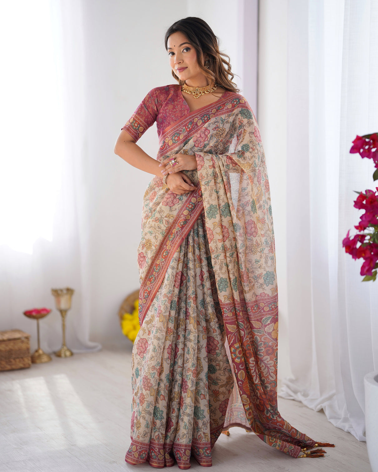 Cream pink handloom cotton saree with pastel floral print and ornamental tree pallu