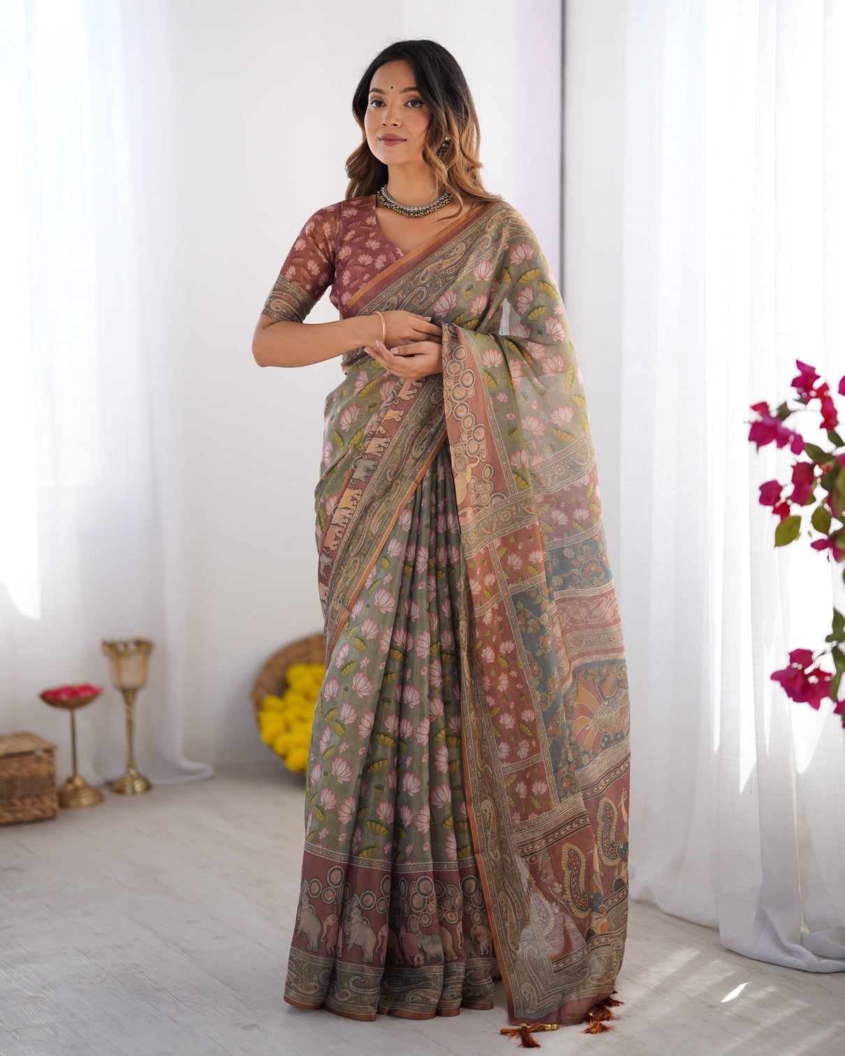 Olive green pure linen cotton handloom saree with pink lotus motifs maroon blouse