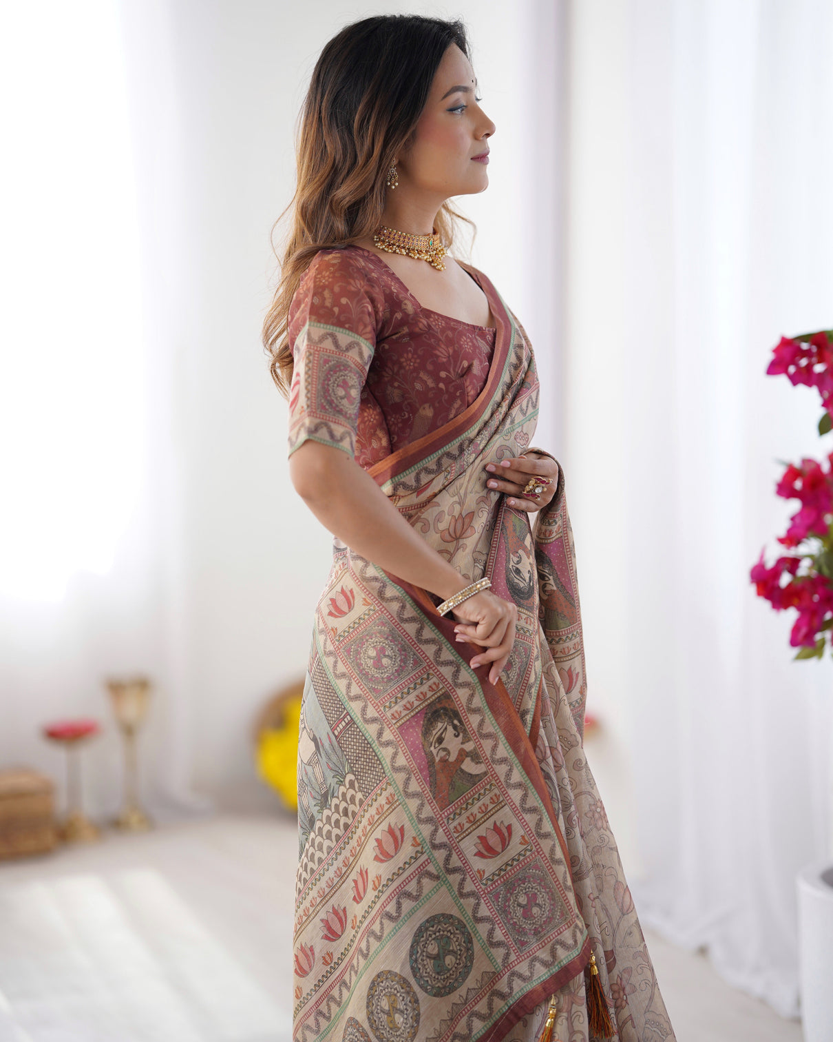 Beige maroon handloom cotton saree with royal faces elephant pallu motif