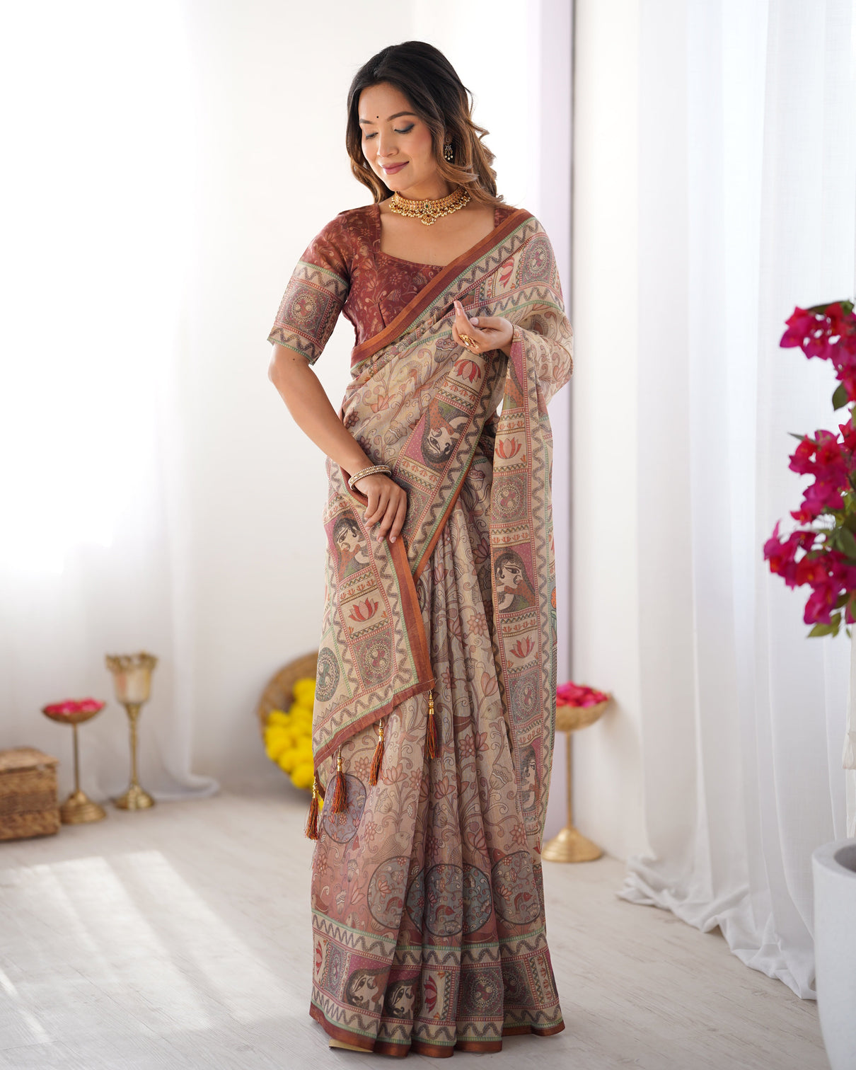 Beige maroon handloom cotton saree with royal faces elephant pallu motif