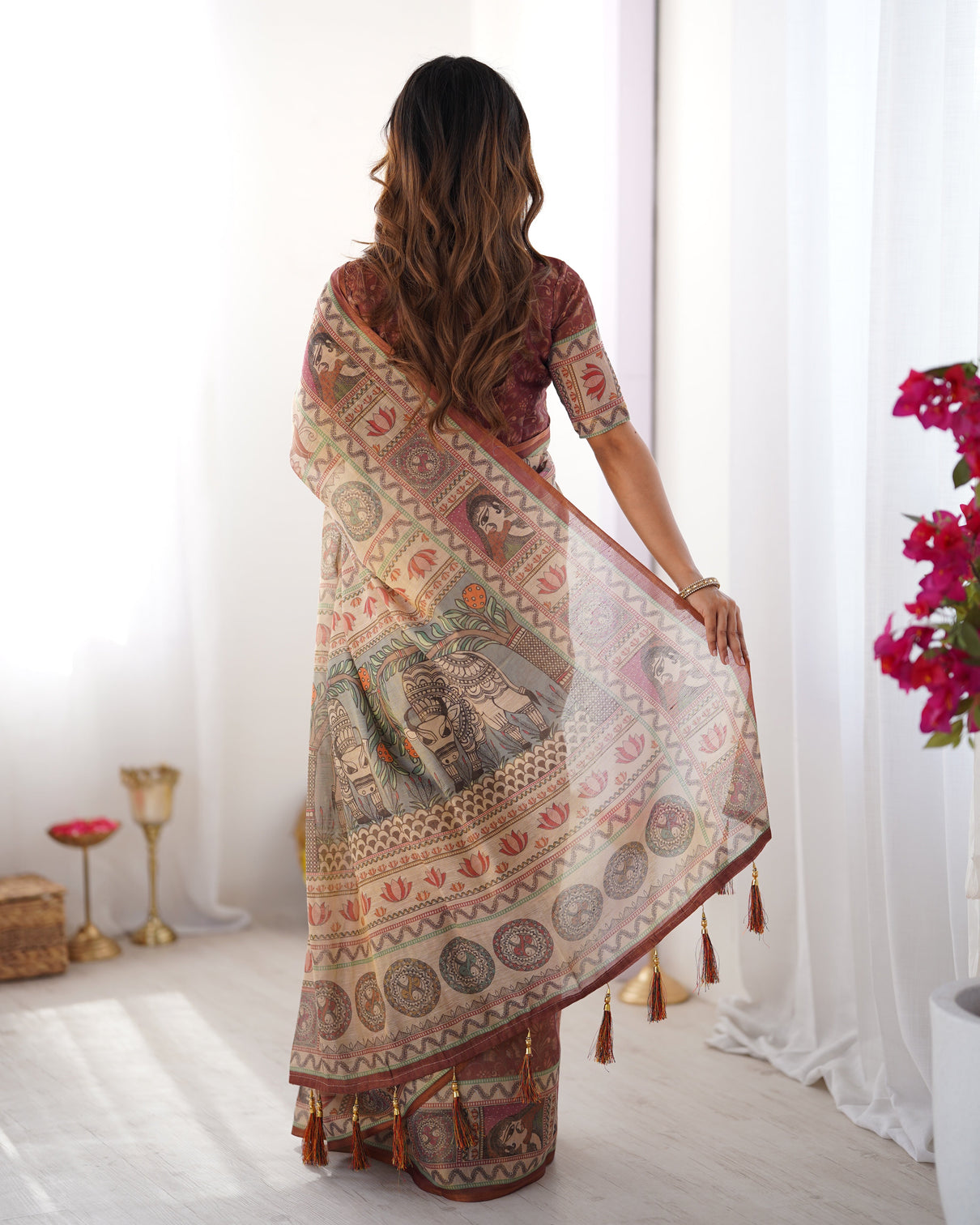 Beige maroon handloom cotton saree with royal faces elephant pallu motif