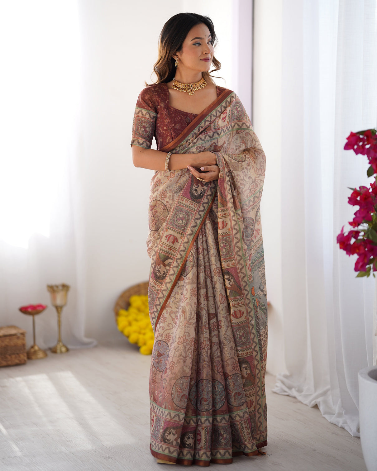 Beige maroon handloom cotton saree with royal faces elephant pallu motif