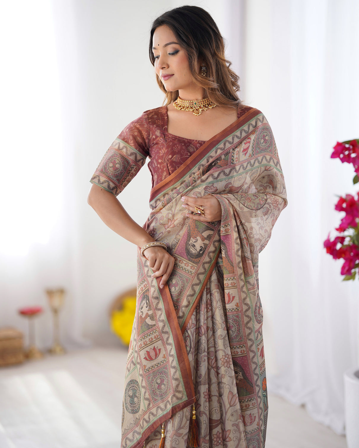 Beige maroon handloom cotton saree with royal faces elephant pallu motif