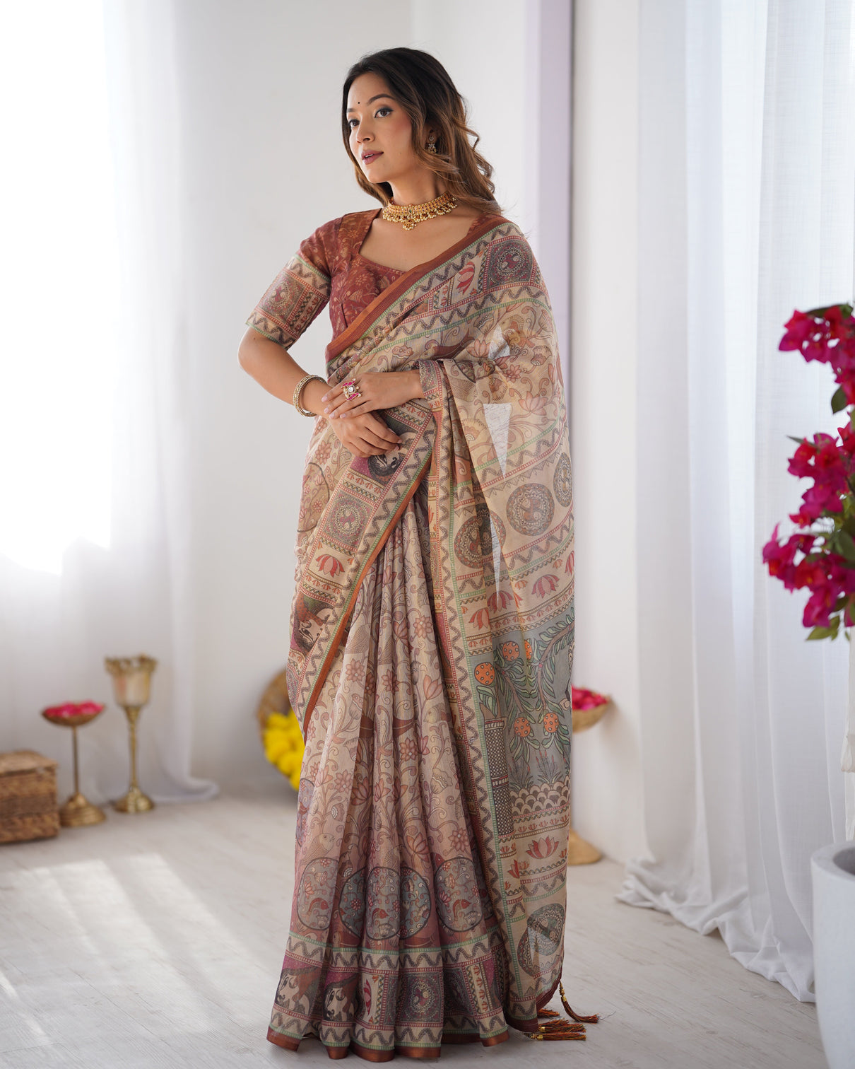 Beige maroon handloom cotton saree with royal faces elephant pallu motif