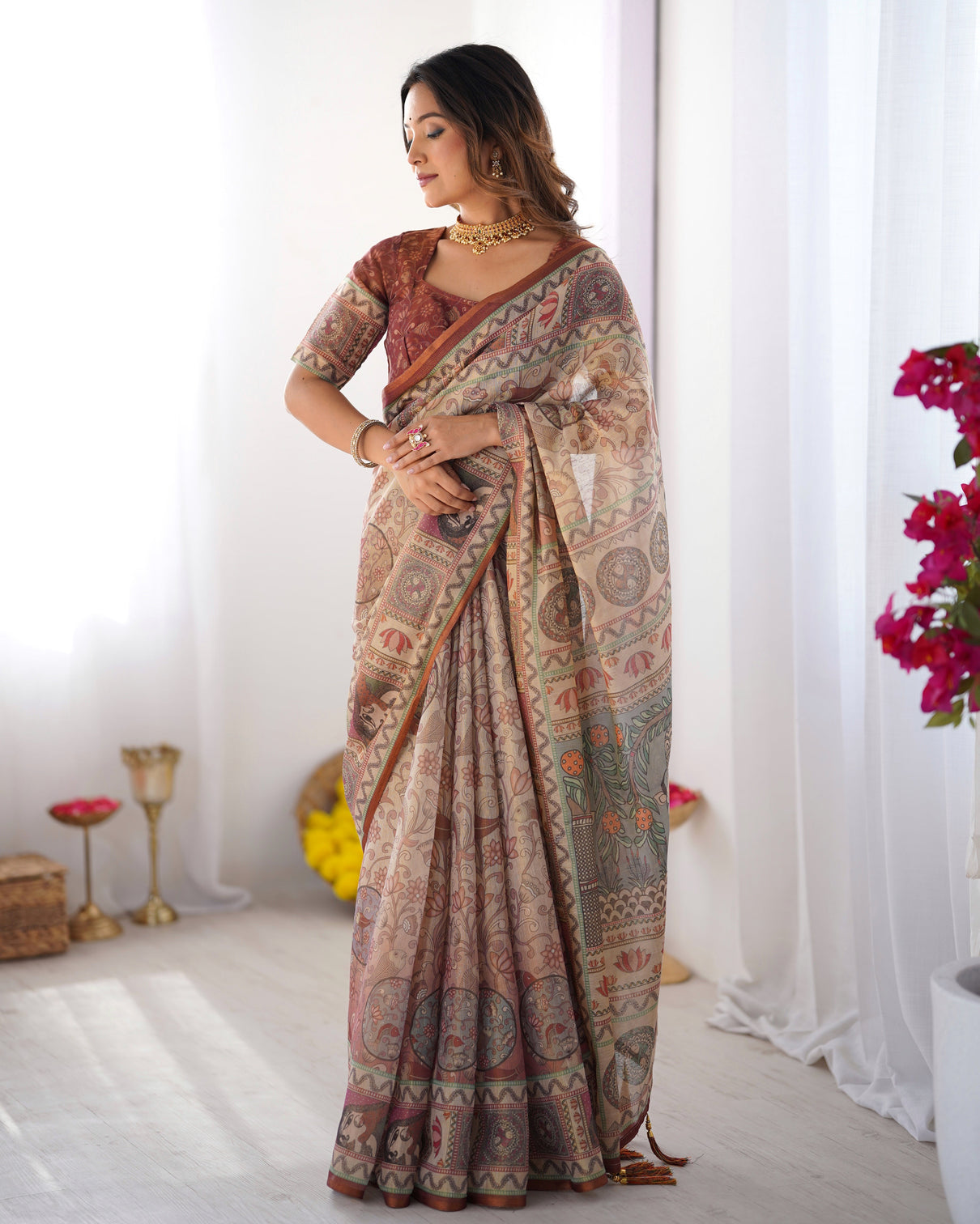 Beige maroon handloom cotton saree with royal faces elephant pallu motif