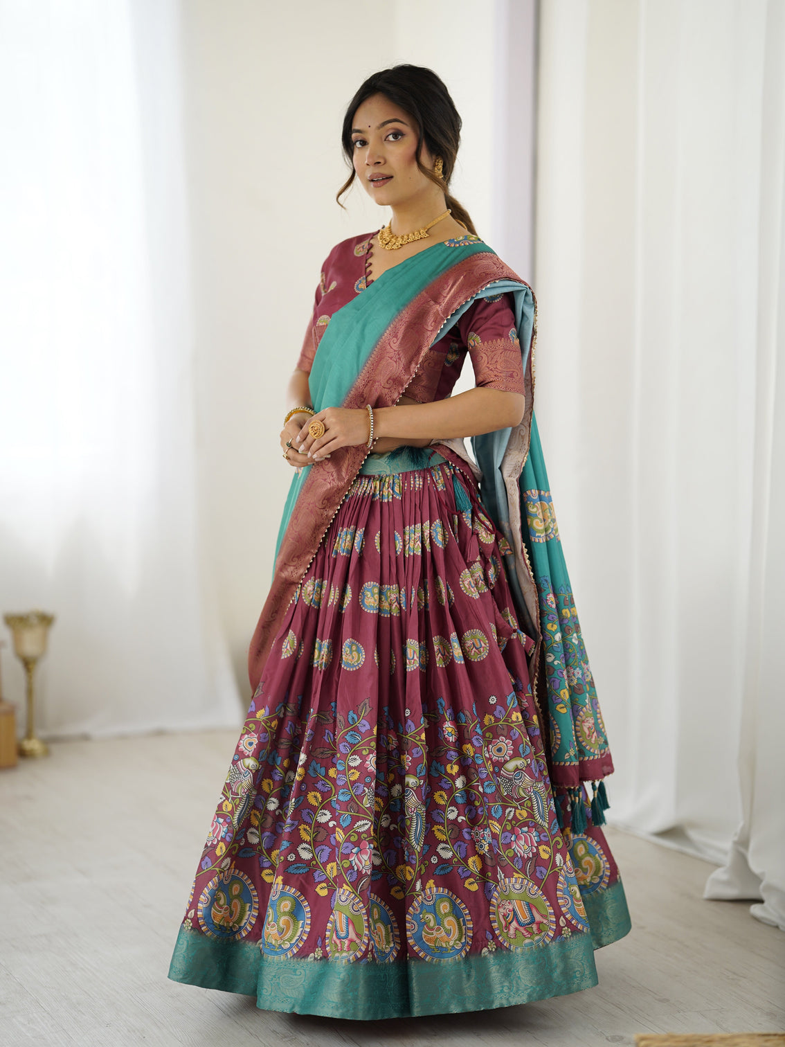 Wine teal kalamkari tussar silk lehenga with zari border tassel dupatta festive wedding wear