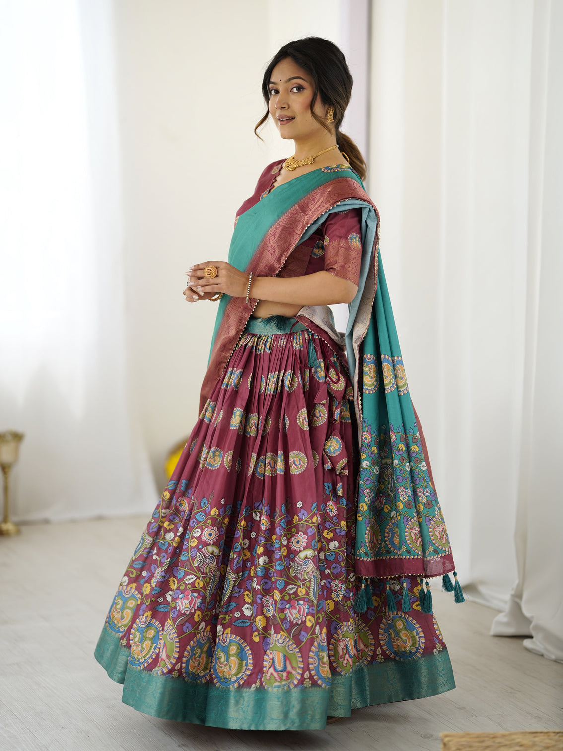 Wine teal kalamkari tussar silk lehenga with zari border tassel dupatta festive wedding wear