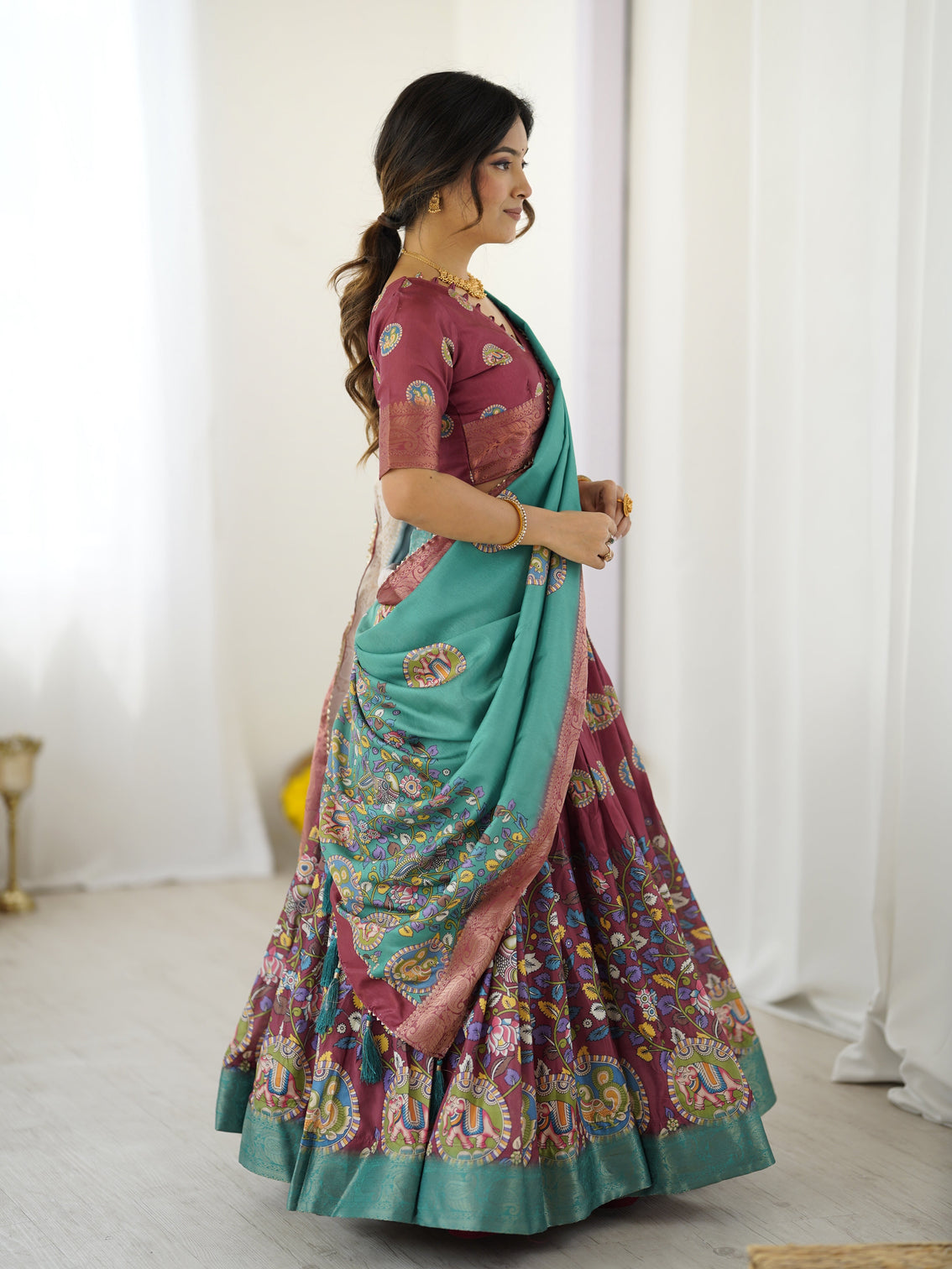 Wine teal kalamkari tussar silk lehenga with zari border tassel dupatta festive wedding wear