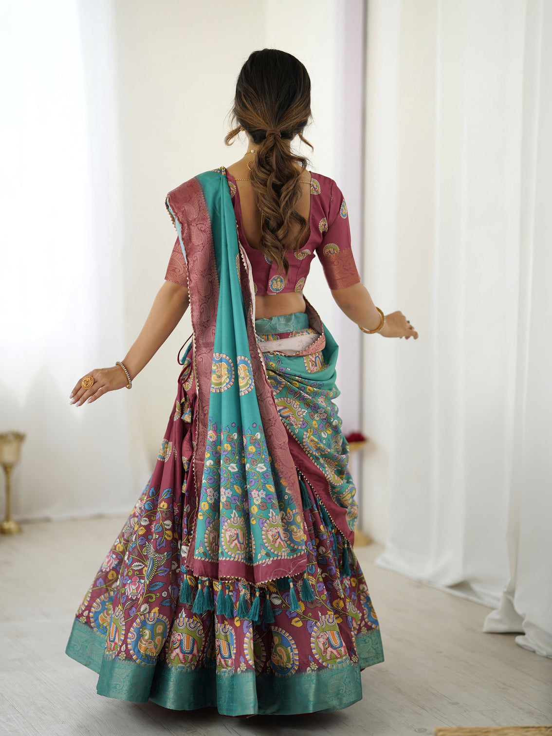 Wine teal kalamkari tussar silk lehenga with zari border tassel dupatta festive wedding wear