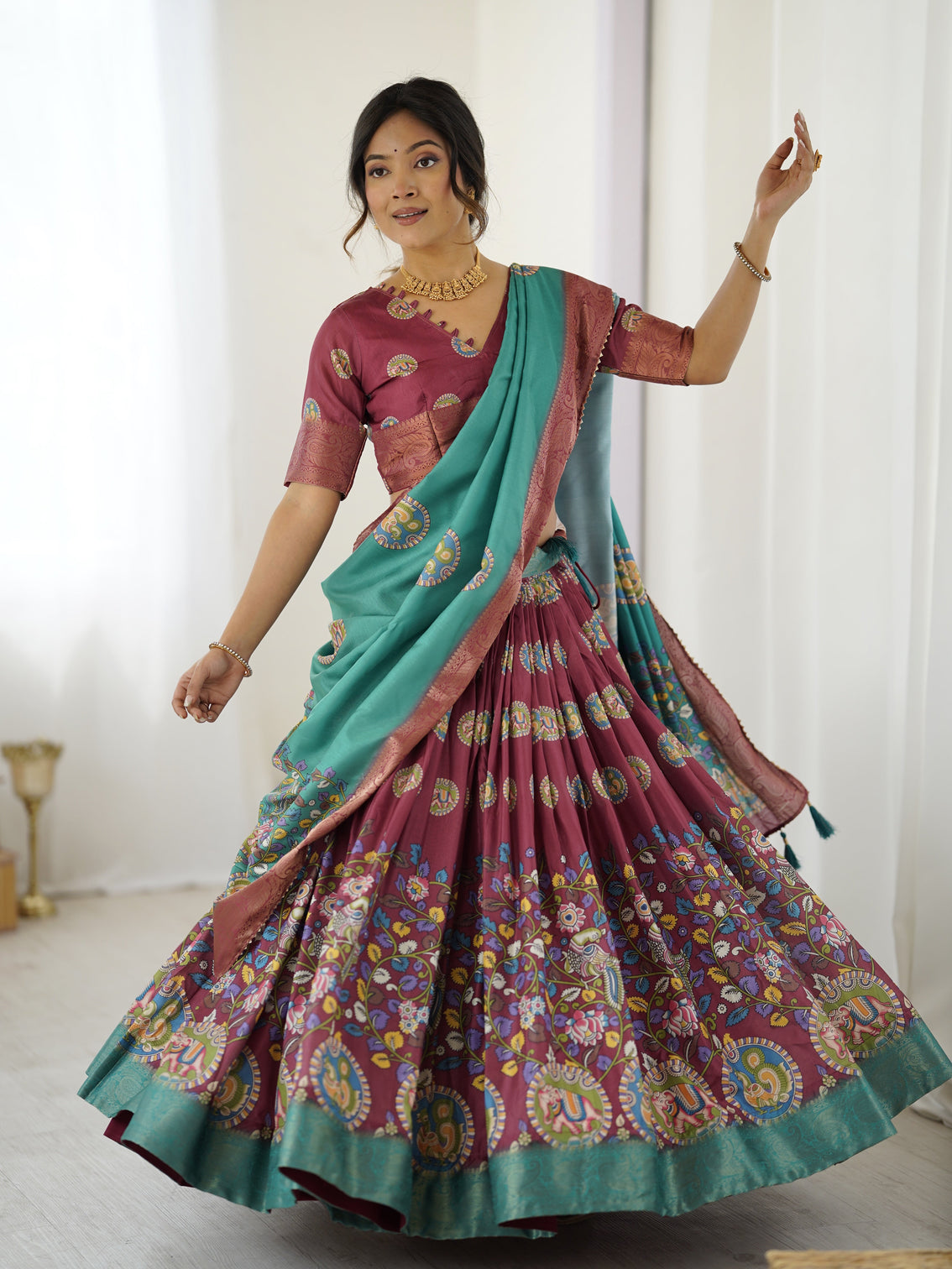 Wine teal kalamkari tussar silk lehenga with zari border tassel dupatta festive wedding wear mameraa