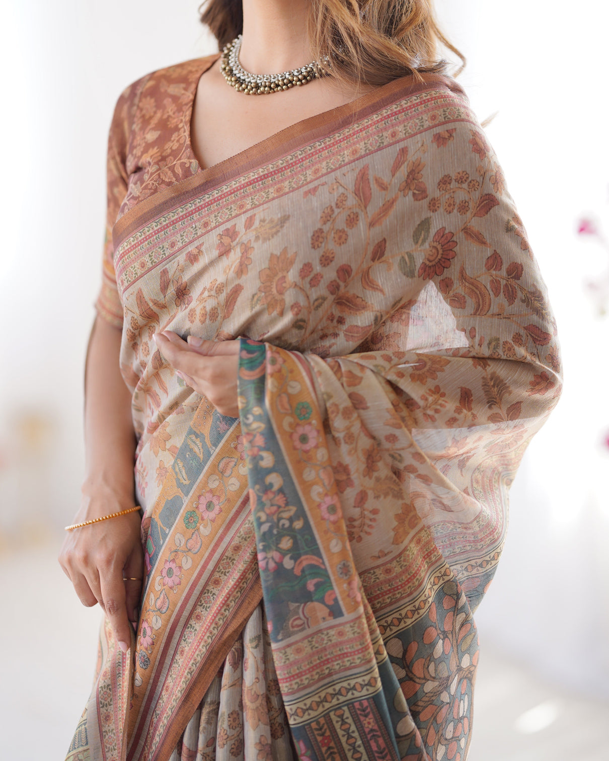 Beige rust pure linen cotton saree with folk animal motif floral print