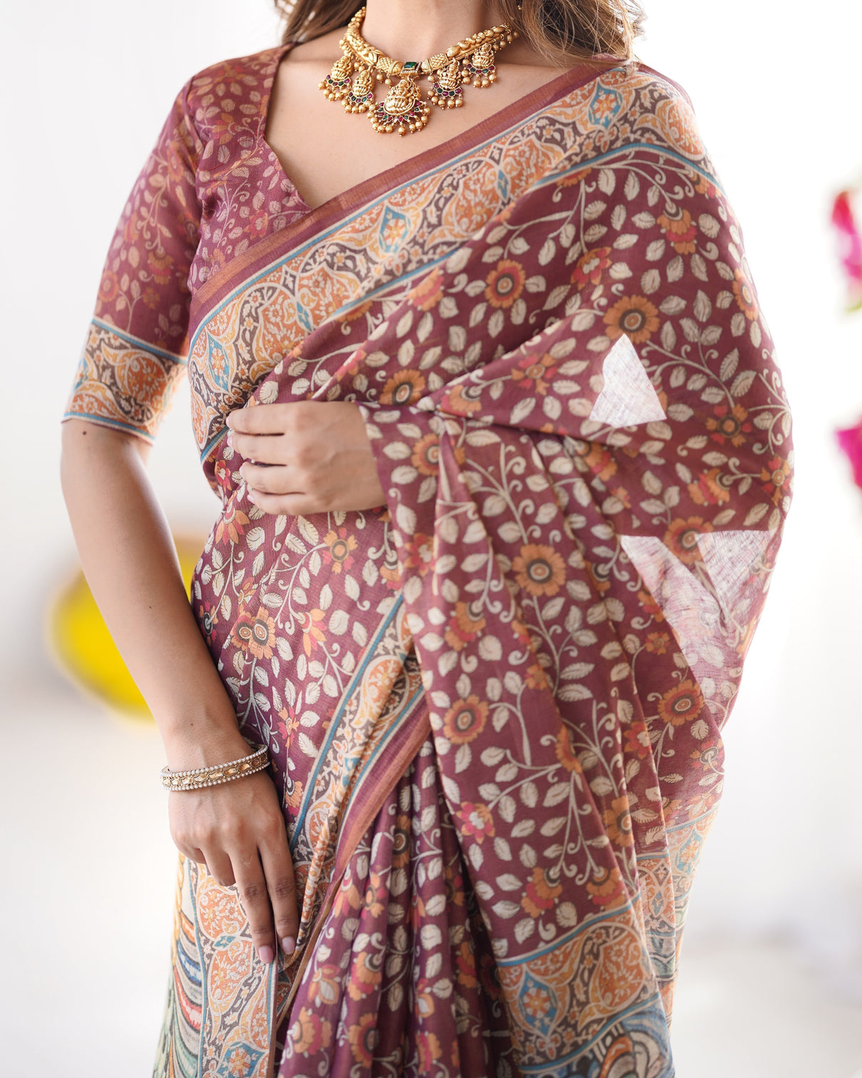 Maroon pure linen cotton handloom saree with floral buti print and madhubani fish art pallu