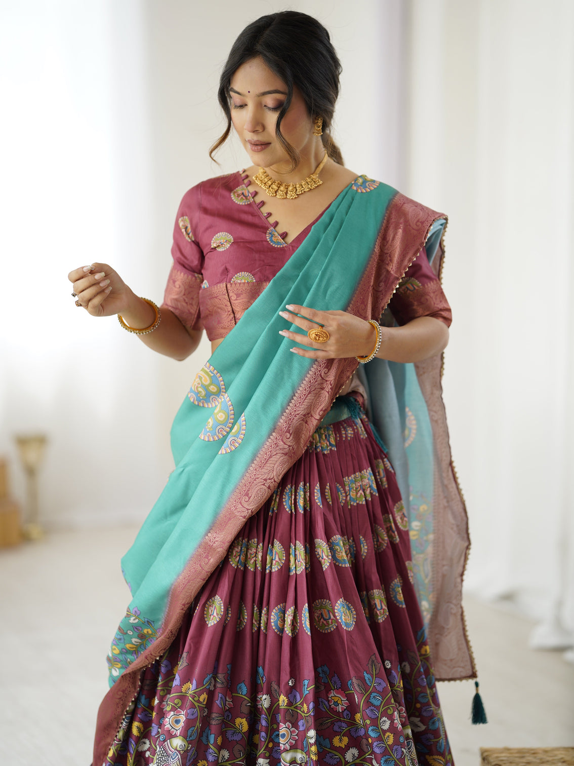 Wine teal kalamkari tussar silk lehenga with zari border tassel dupatta festive wedding wear