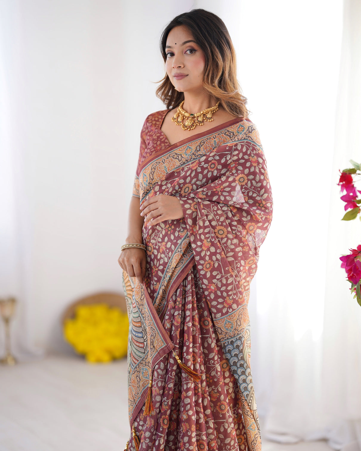 Maroon pure linen cotton handloom saree with floral buti print and madhubani fish art pallu