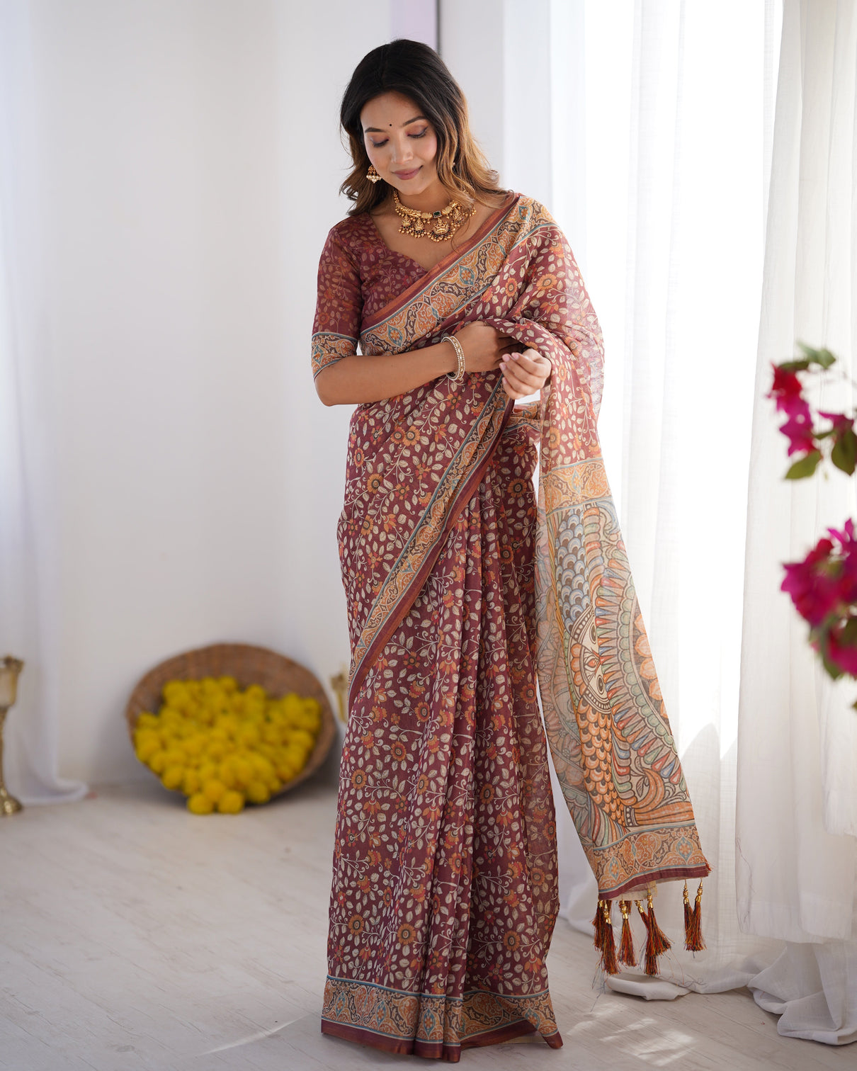 Maroon pure linen cotton handloom saree with floral buti print and madhubani fish art pallu