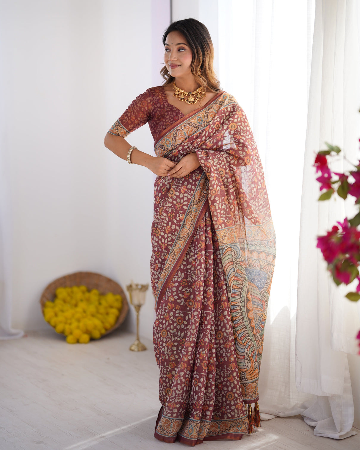 Maroon pure linen cotton handloom saree with floral buti print and madhubani fish art pallu