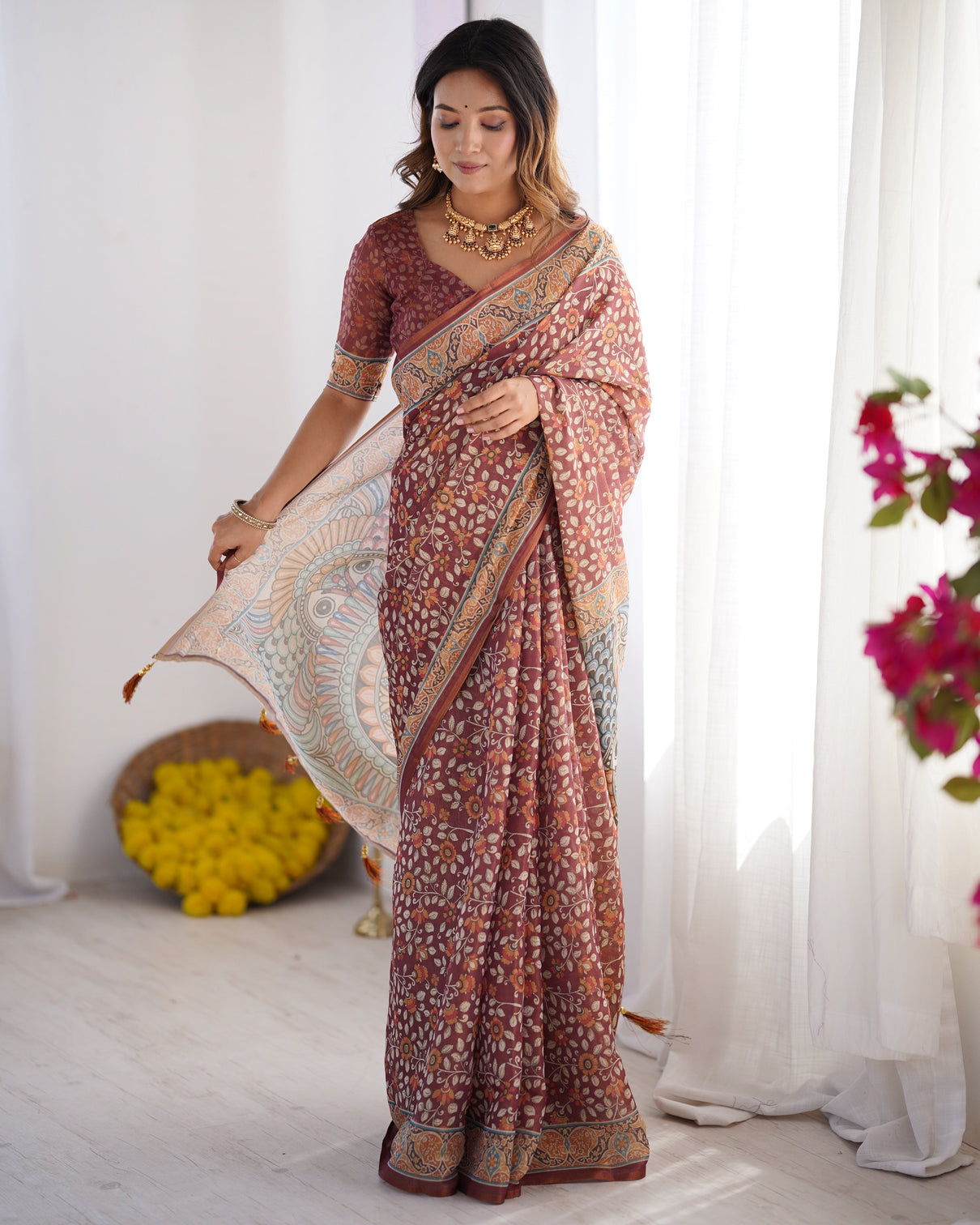 Maroon pure linen cotton handloom saree with floral buti print and madhubani fish art pallu