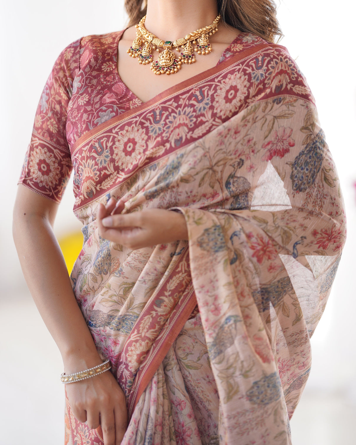 Blush cream handloom linen cotton saree with artistic bird motif pallu