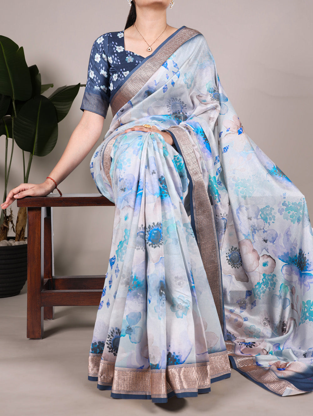Sky blue tussar silk floral printed saree with viscose border blue blouse