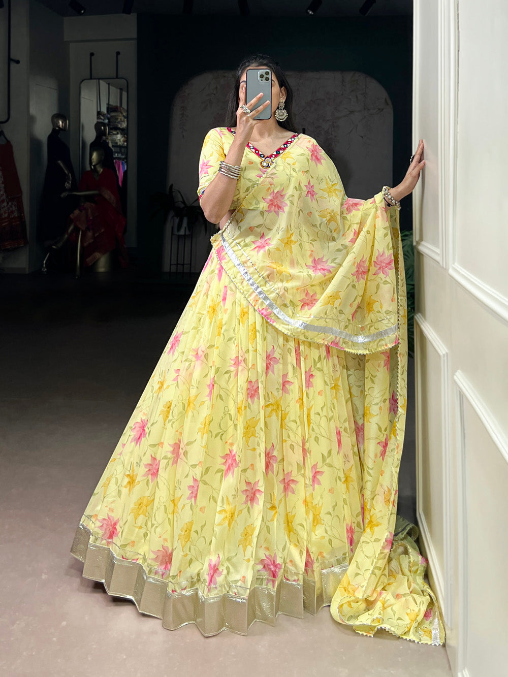 Yellow tubby silk floral printed lehenga choli with mirror work embossed lace detailing