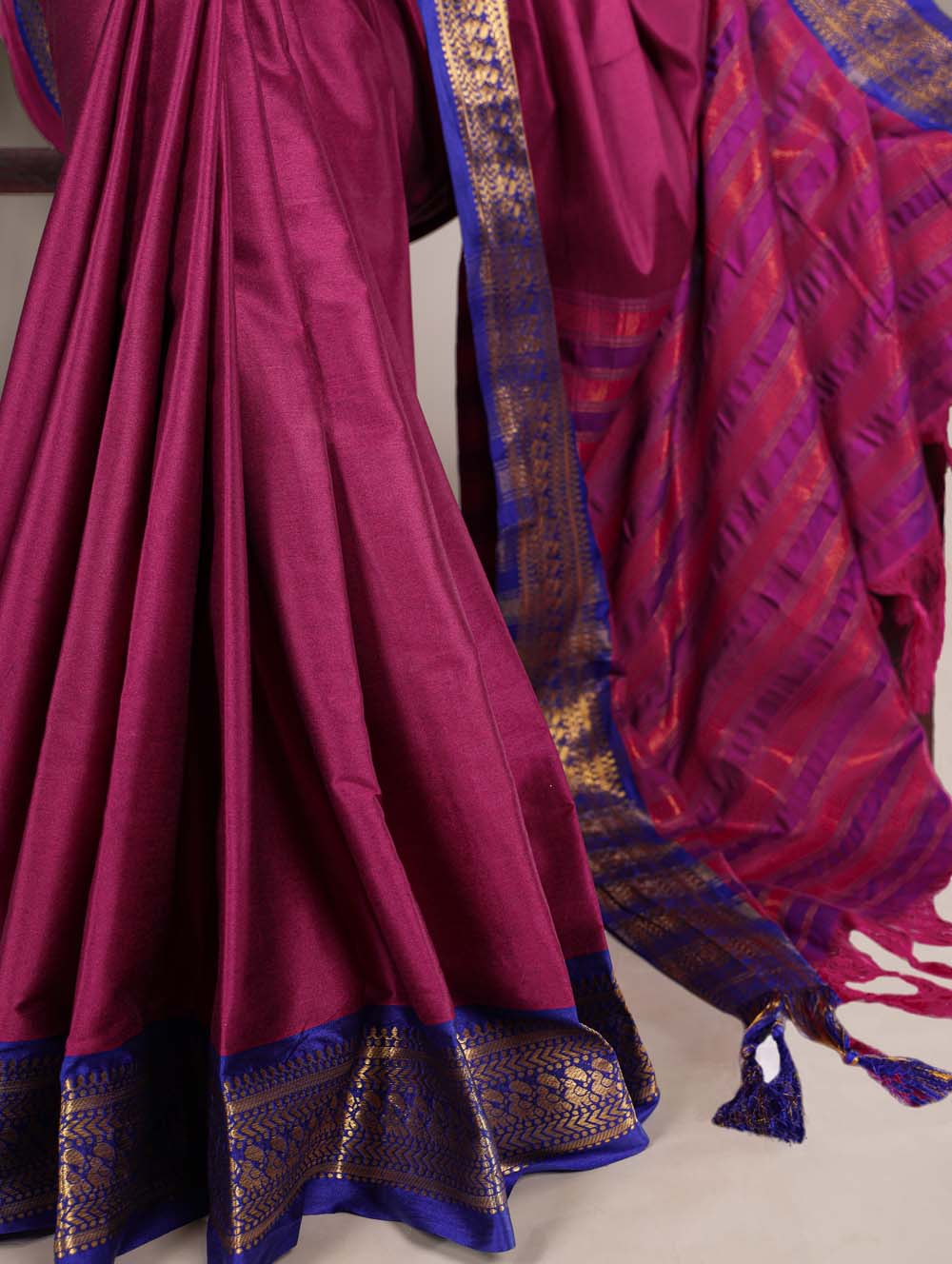 Pink aura silk saree with zari weaving and blue blouse
