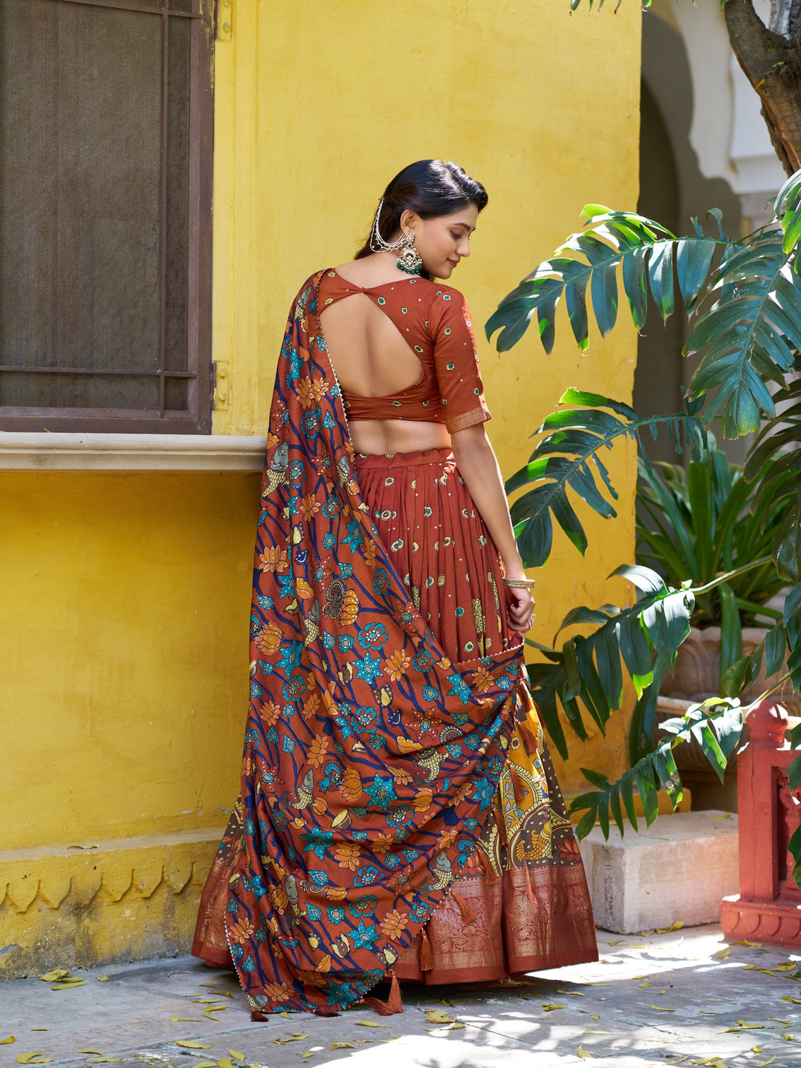 Rust orange color foil work lehenga choli