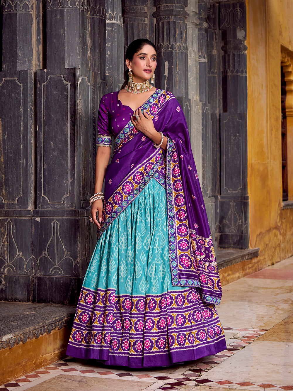 Sky blue tasar silk ikat patola print lehenga choli with purple embroidered blouse dupatta