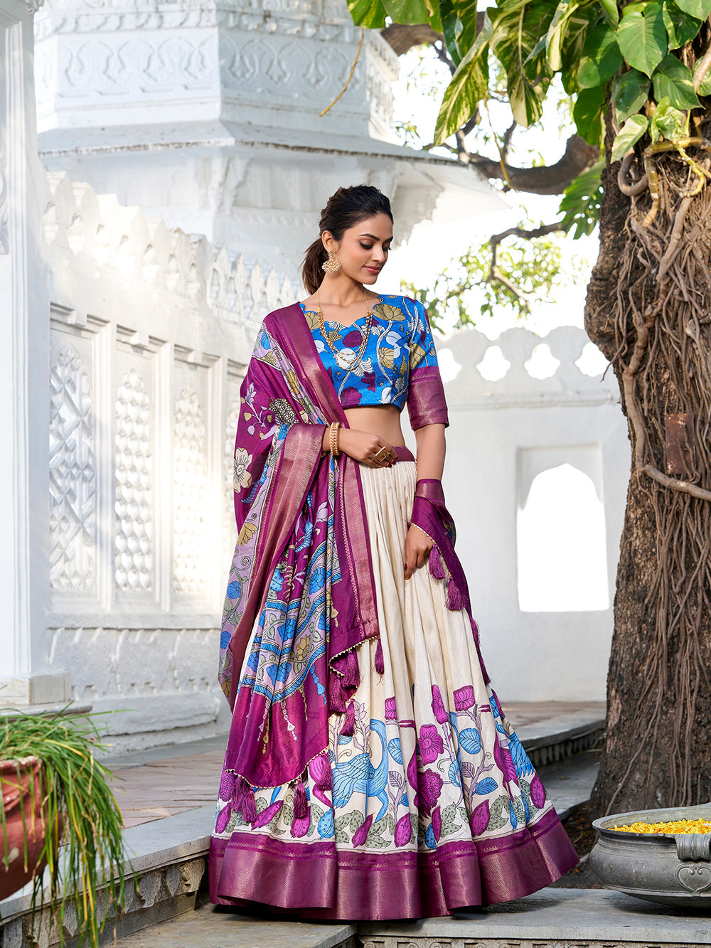 Off white color printed kalamkari with zari weaving border jacquard silk lehenga choli