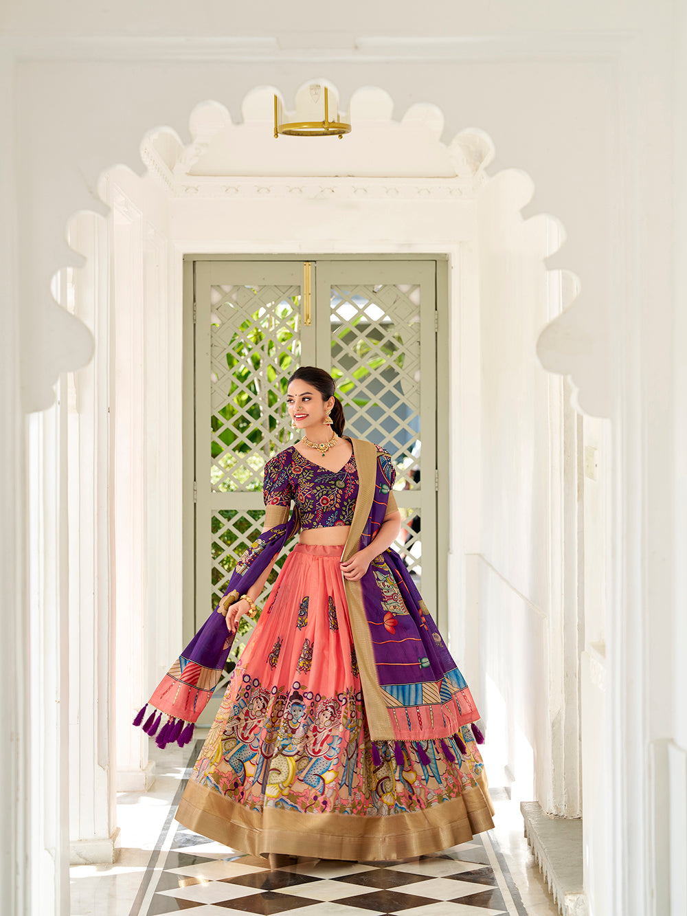 Peach dola silk kalamkari print lehenga with purple dupatta unstitched blouse