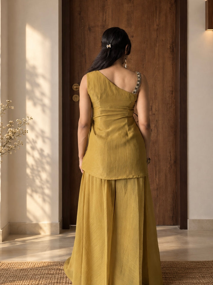 Mustard yellow asymmetric angrakha kurta set with flared sharara dupatta