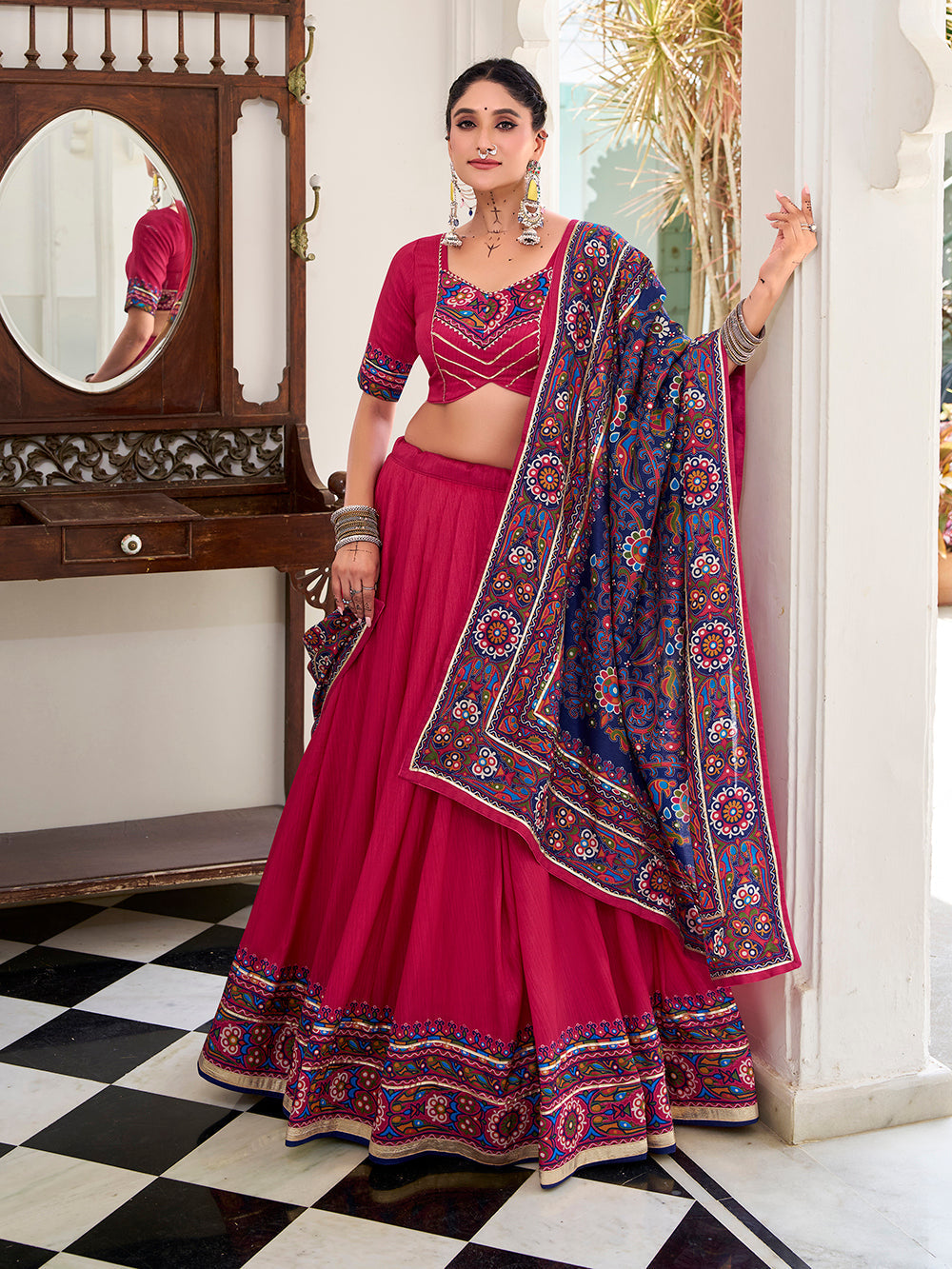 Pink tasar silk gamthi print lehenga choli with embossed design gotta patti work