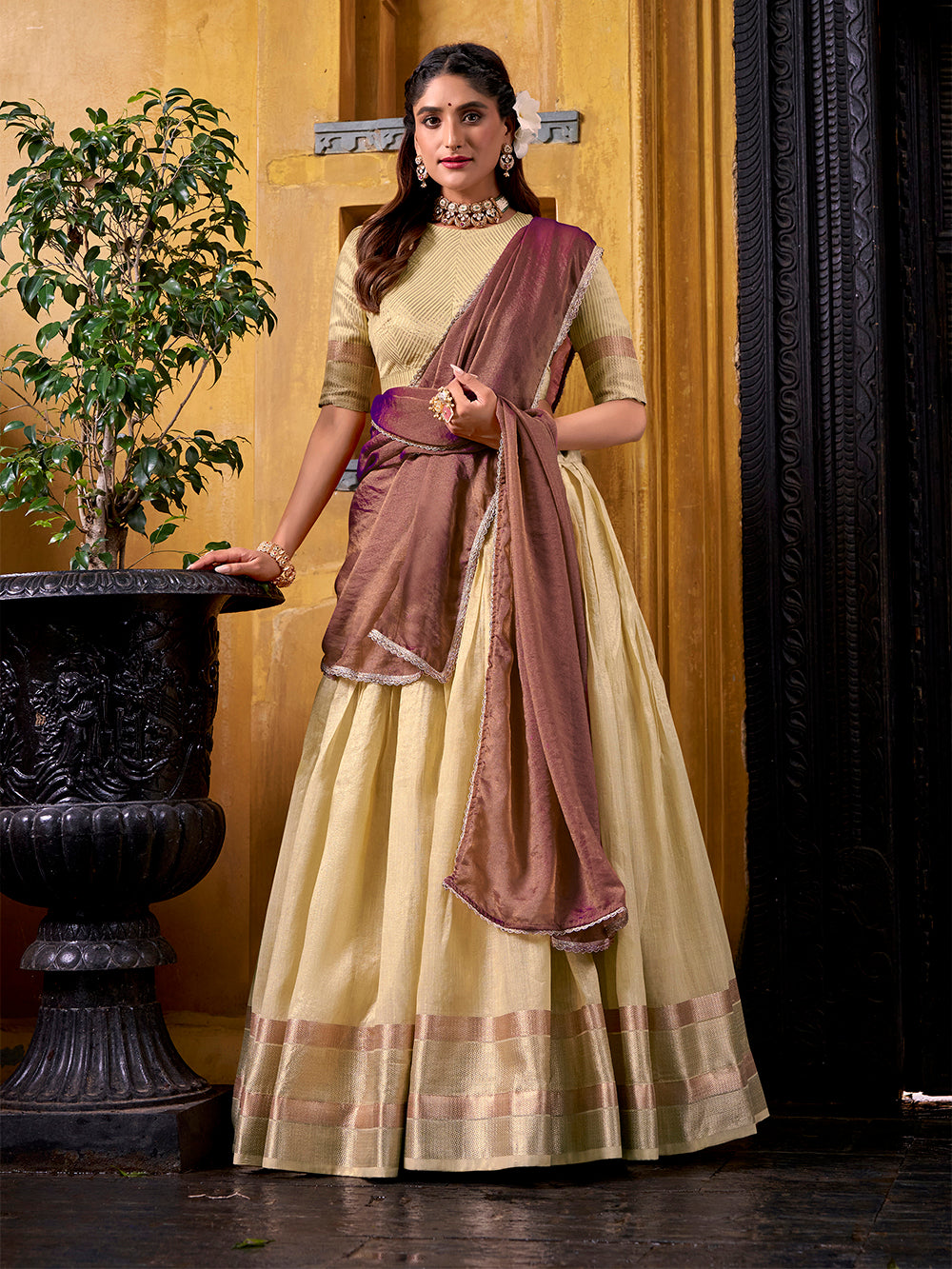 Yellow dupion silk lehenga choli with zari weaving border shimmer lace dupatta