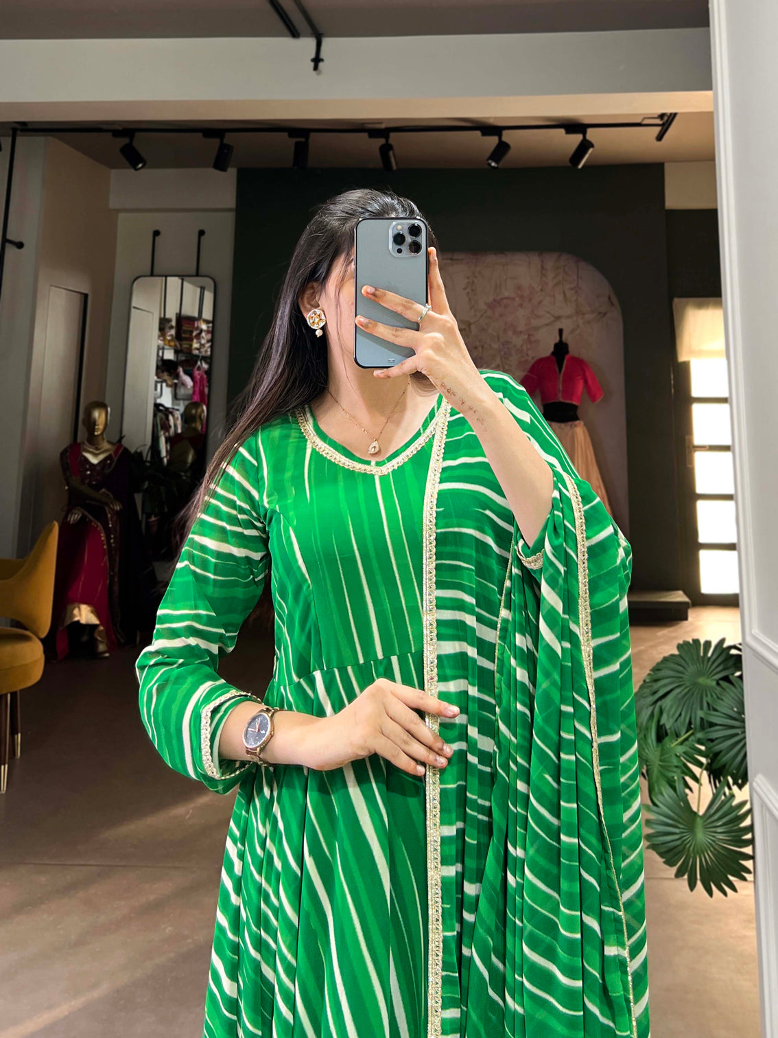 Green color leheriya with lace touch up georgette gown