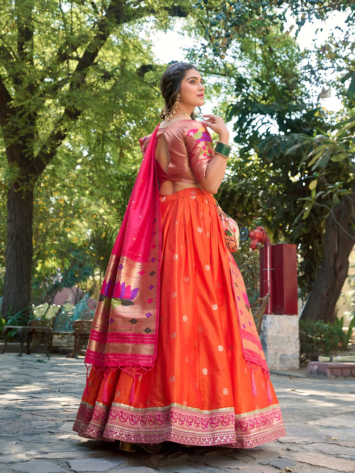 Orange color weaving zari work jacquard silk lehenga choli