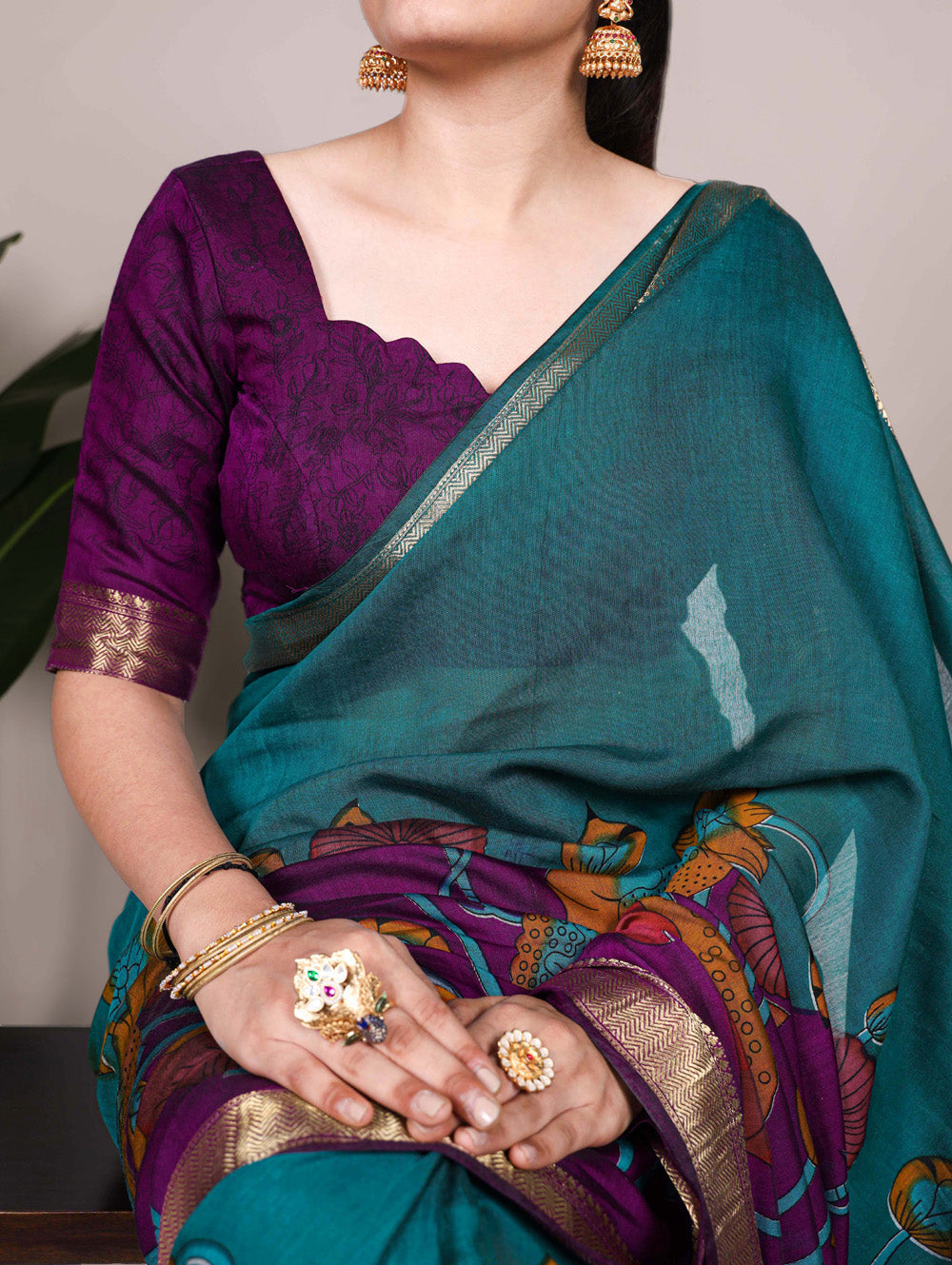 Teal floral printed viscose chanderi silk saree with zari weaving border