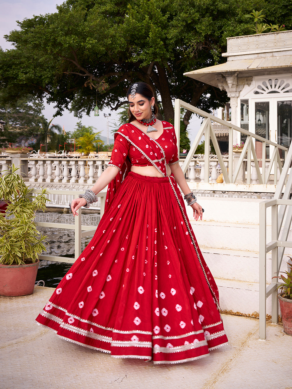 Red chanderi bandhej print chaniya choli with lace detailing 6 meter flair