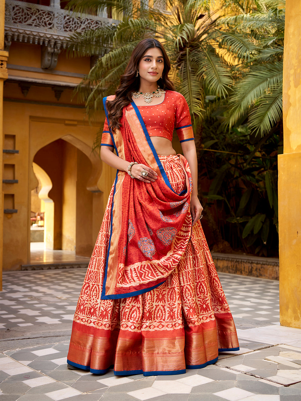 Rust orange color batik printed dola silk lehenga