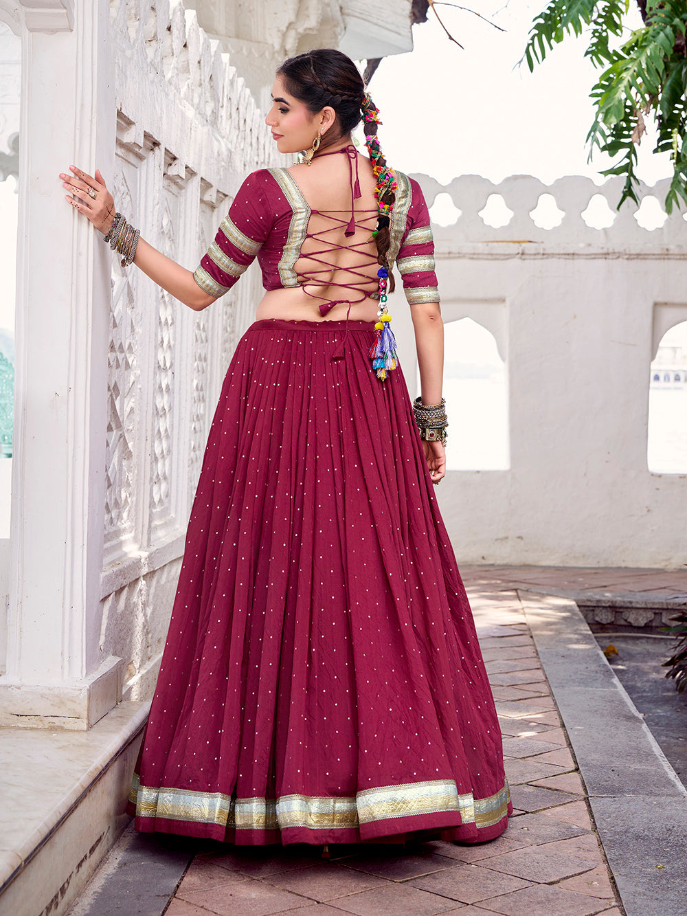 Maroon chanderi zari weaving lehenga choli with embossed lace dupatta